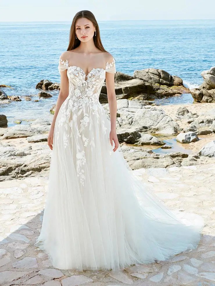 Model wearing a Love by Enzoani gown